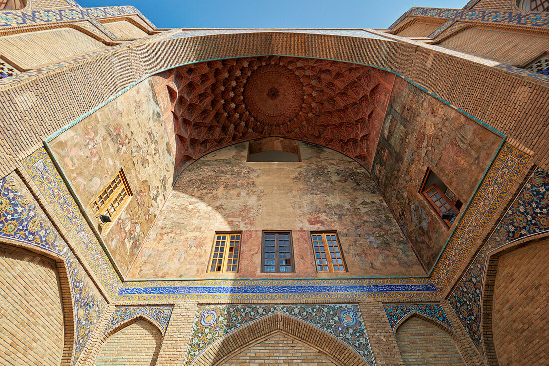 The vaulted ceiling of the intrance iwan of the Qeysarie Gate, the main gateway to the Grand Bazaar of Isfahan in Naqsh-e Jahan Square. Isfahan, Iran.