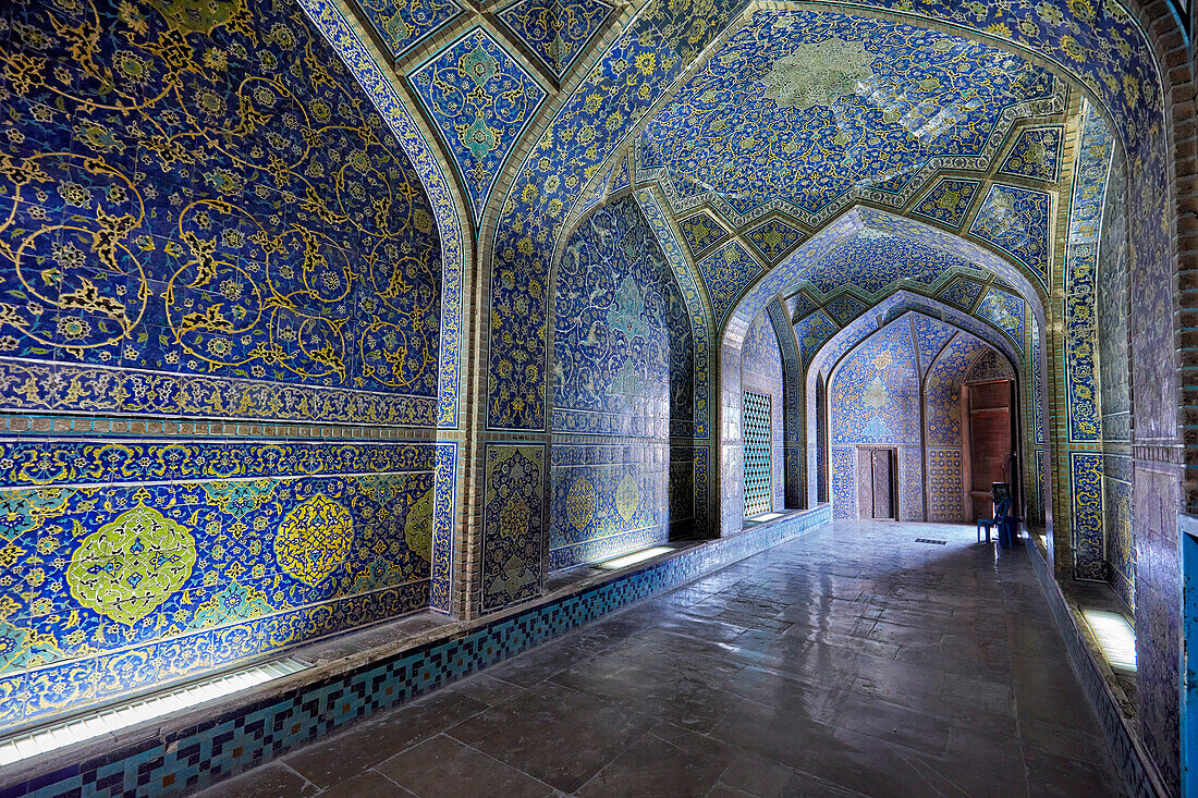 Interior view of the Shah Mosque (Masjed-e Shah) showing its highly elaborate tilework on walls and ceiling. Isfahan, Iran.