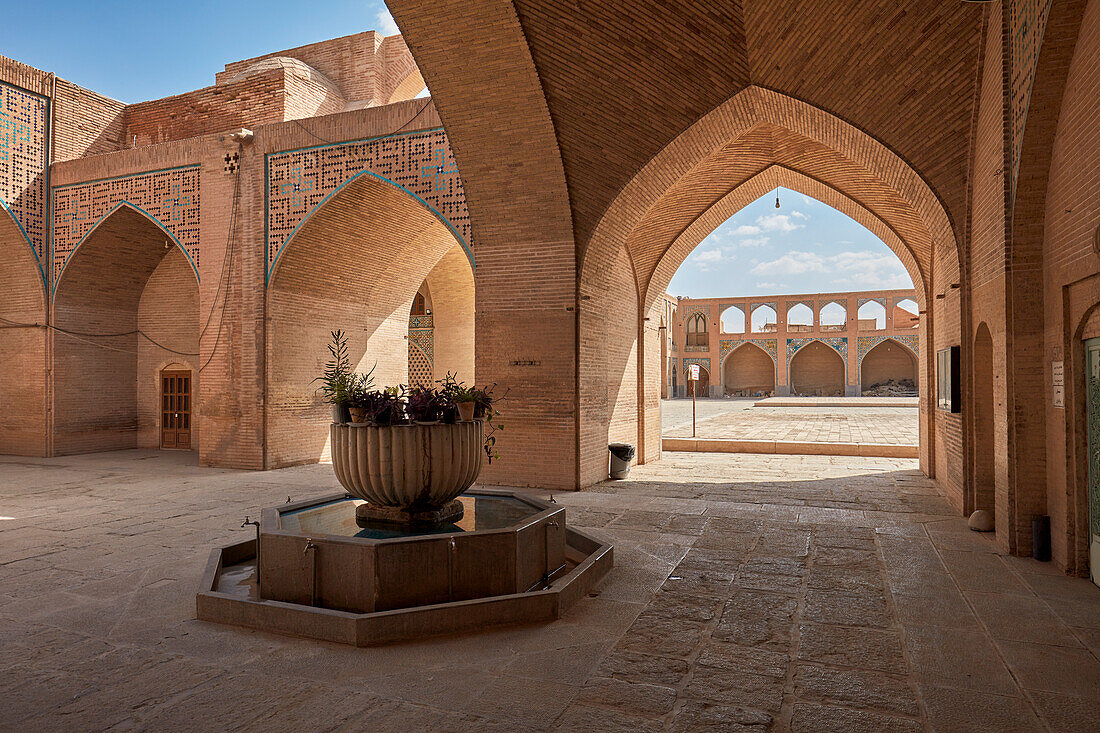 Courtyard view of the 17th century Hakim Mosque in the historic center of Isfahan, Iran.