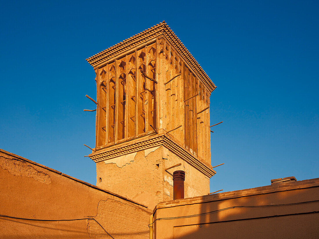 Windcatcher - traditional tower used for cross ventilation and passive cooling of buildings in the historical Old City of Yazd, Iran.