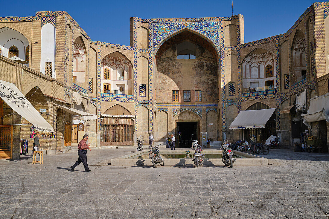 Front view of the Qeysarie Gate, the main gateway to the Grand Bazaar of Isfahan in Naqsh-e Jahan Square. Isfahan, Iran.