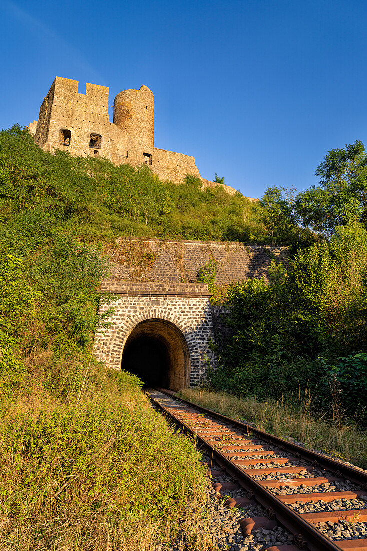  View of the Löwenburg and railway tracks, Monreal, Mayen-Koblenz district, Rhineland-Palatinate, Germany 