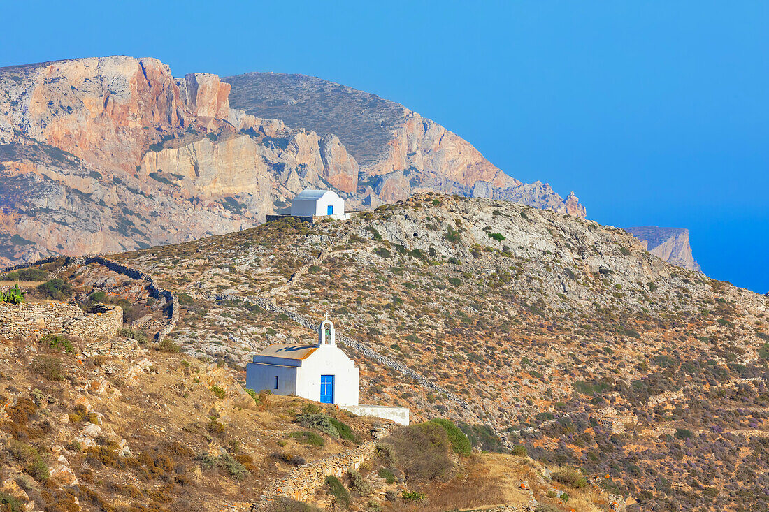 Orthodox chapels spread around Folegrandos island North Western coast, Folegandros Island, Cyclades Islands, Greece