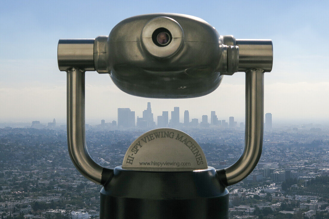   viewing machine at Griffith Observatory looking towards Downton Los Angeles California focus back 