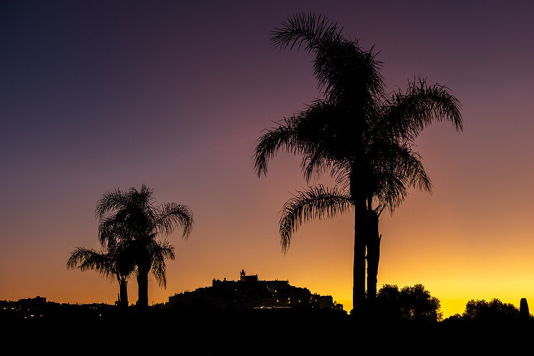 Beautiful sunset view on the old town Ostuni, Puglia, Italy.