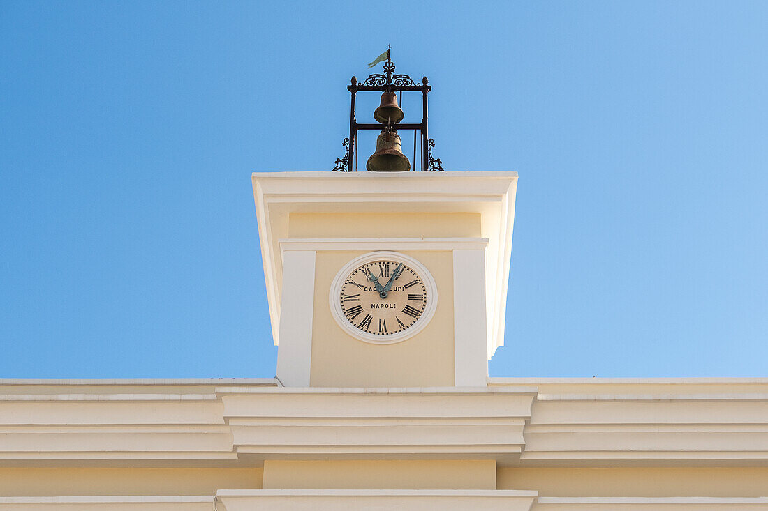 Clock and bells at Piazza IV Novembre in Mesagne, Puglia, Italy.