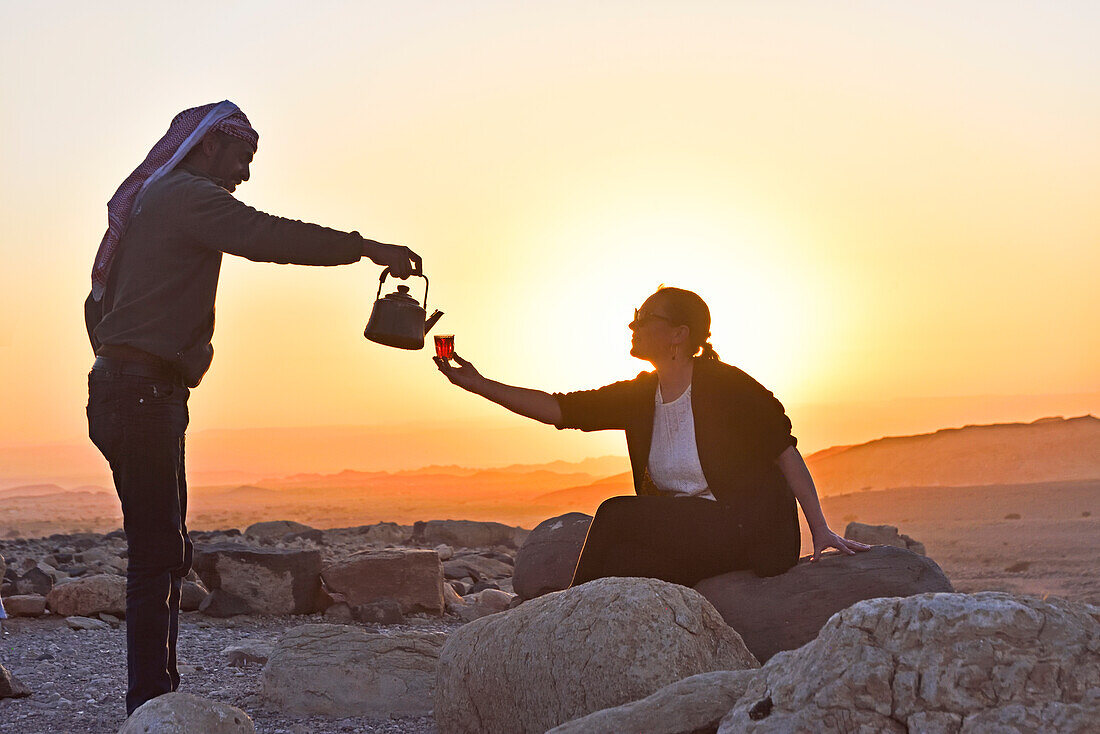 Tea break and sunset watching from a mountain overlooking the Wadi Dana and the Araba Valley, Dana Biosphere Reserve, Jordan, Near East, Southern Levant, West Asia