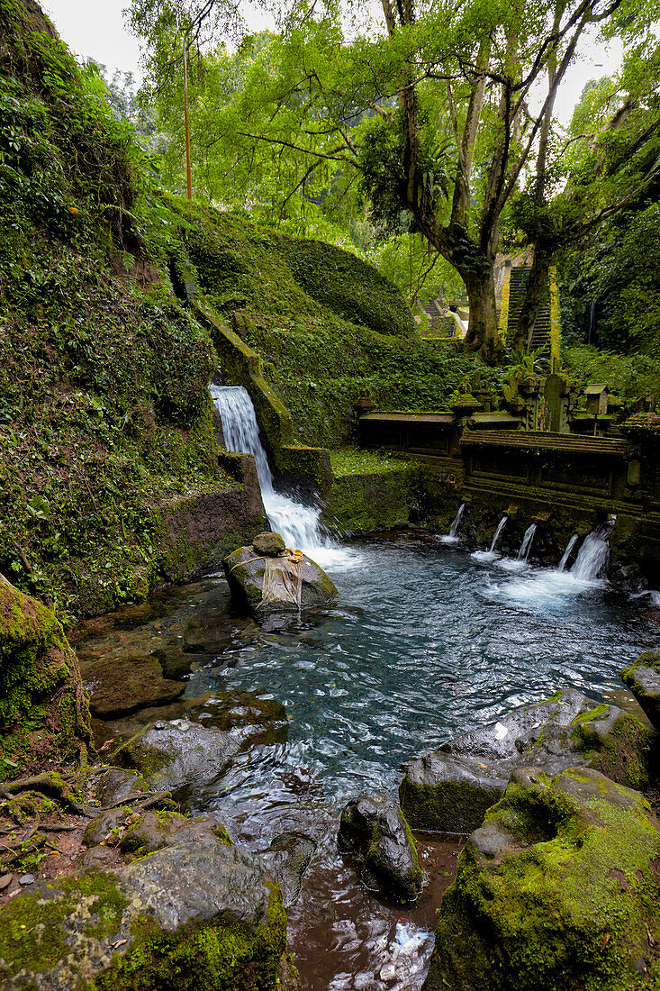 A view of the men's half of the bathing pool in the Mengening Temple. Tampaksiring, Bali, Indonesia.