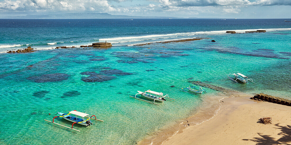 Aerial view of the Mendira Bay near Candidasa village. Manggis subdistrict, Karangasem regency, Bali, Indonesia.