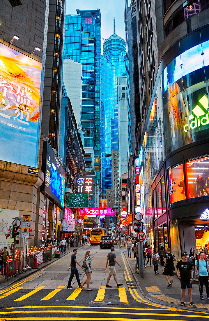 Modern highrises with colourful neon signage on the D'Aguilar street. Central, Hong Kong, China.