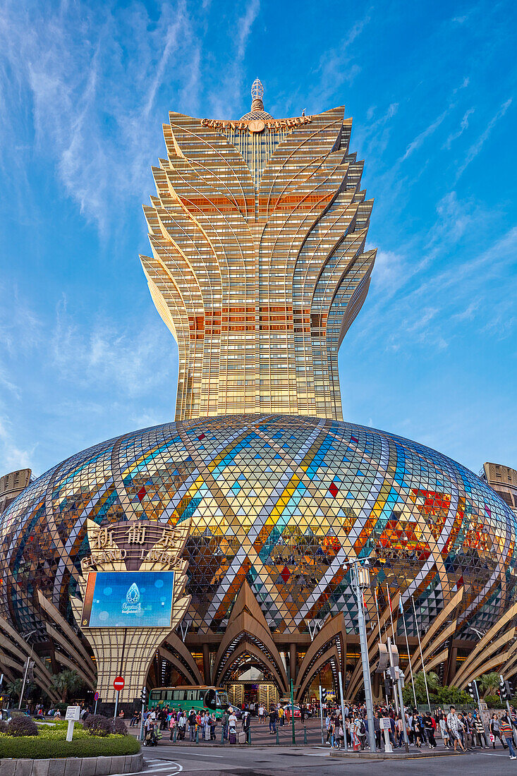 Exterior view of the Hotel Grand Lisboa with its iconic shiny golden dome. Macau, China.