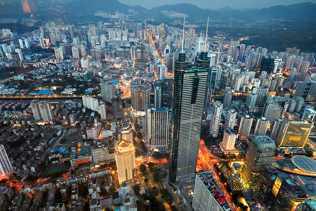 Aerial city view from the top of KK100 (Kingkey 100) skyscraper at dusk. Luohu District, Shenzhen, Guangdong Province, China.