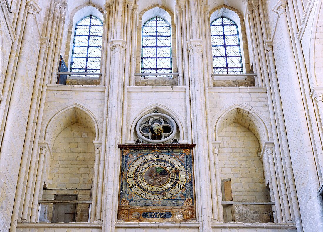  Historic clock with tide display in the church Abbatiale de la Sainte-Trinité (Ste-Trinite) in Fécamp (Fecamp) on the Alabaster Coast, (Côte d&#39;Albatre, Cote d&#39;Albatre) in Normandy in France 