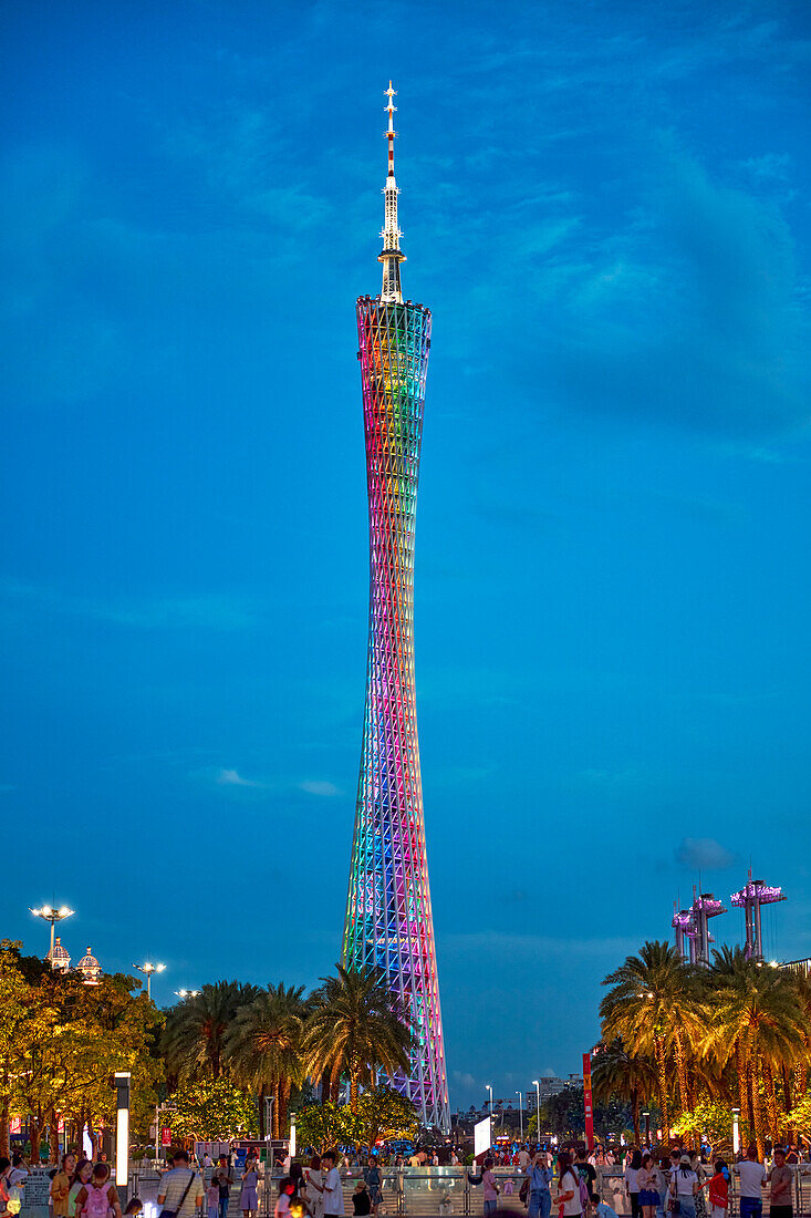 The Canton Tower, a 604-meter-tall modern multipurpose structure, brightly illuminated at dusk. Guangzhou, Guangdong Province, China.