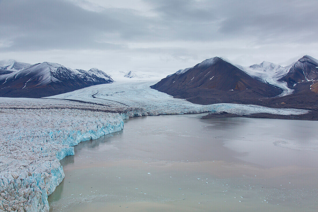  View of the glaciers Osbornebreen and Vintervegen, St. Jonsfjord, Spitsbergen, Norway 