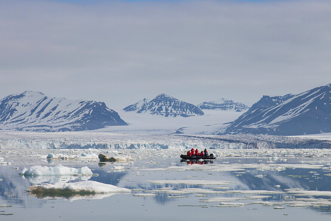  Dinghy with tourists in St. Jonsfjorden, Svalbard, Norway 