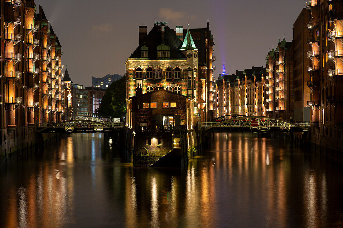  View of the moated castle in the evening, Speicherstadt, Hanseatic City of Hamburg, Germany 