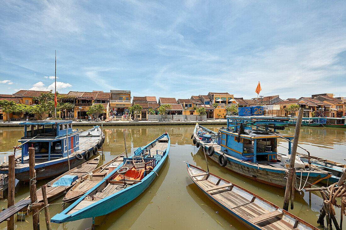 Traditional boats on the Thu Bon River in Hoi An Ancient Town. Hoi An, Quang Nam Province, Vietnam.