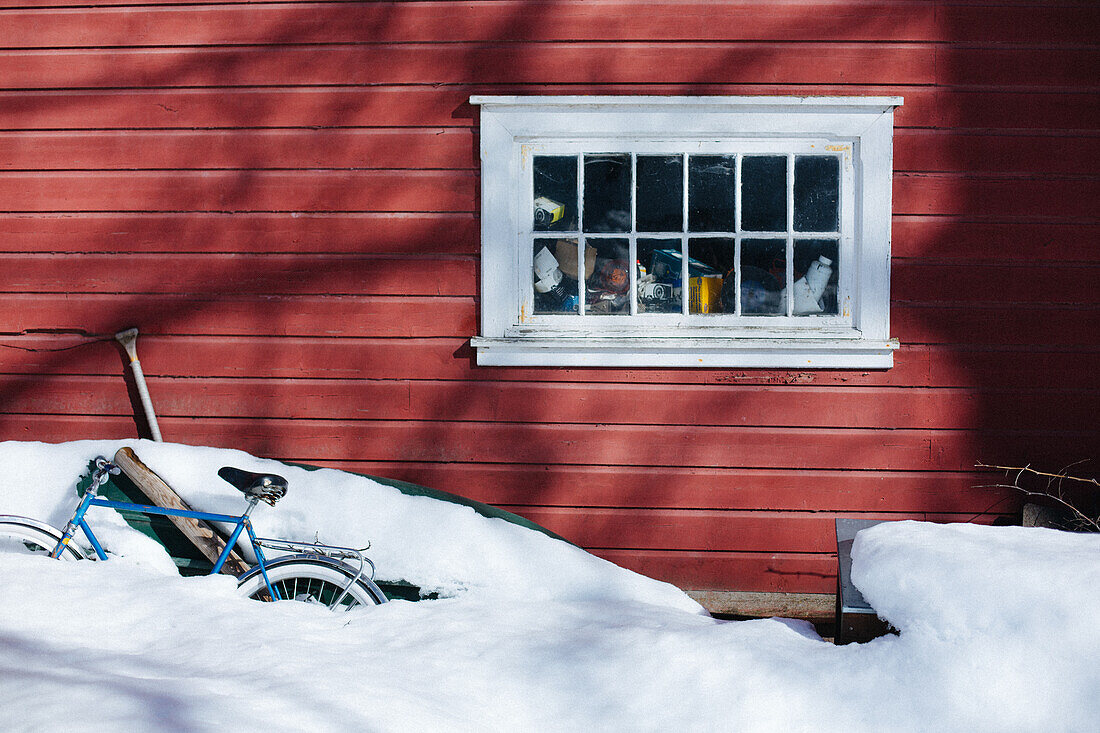 Norways, window pane, bicycle in the snow