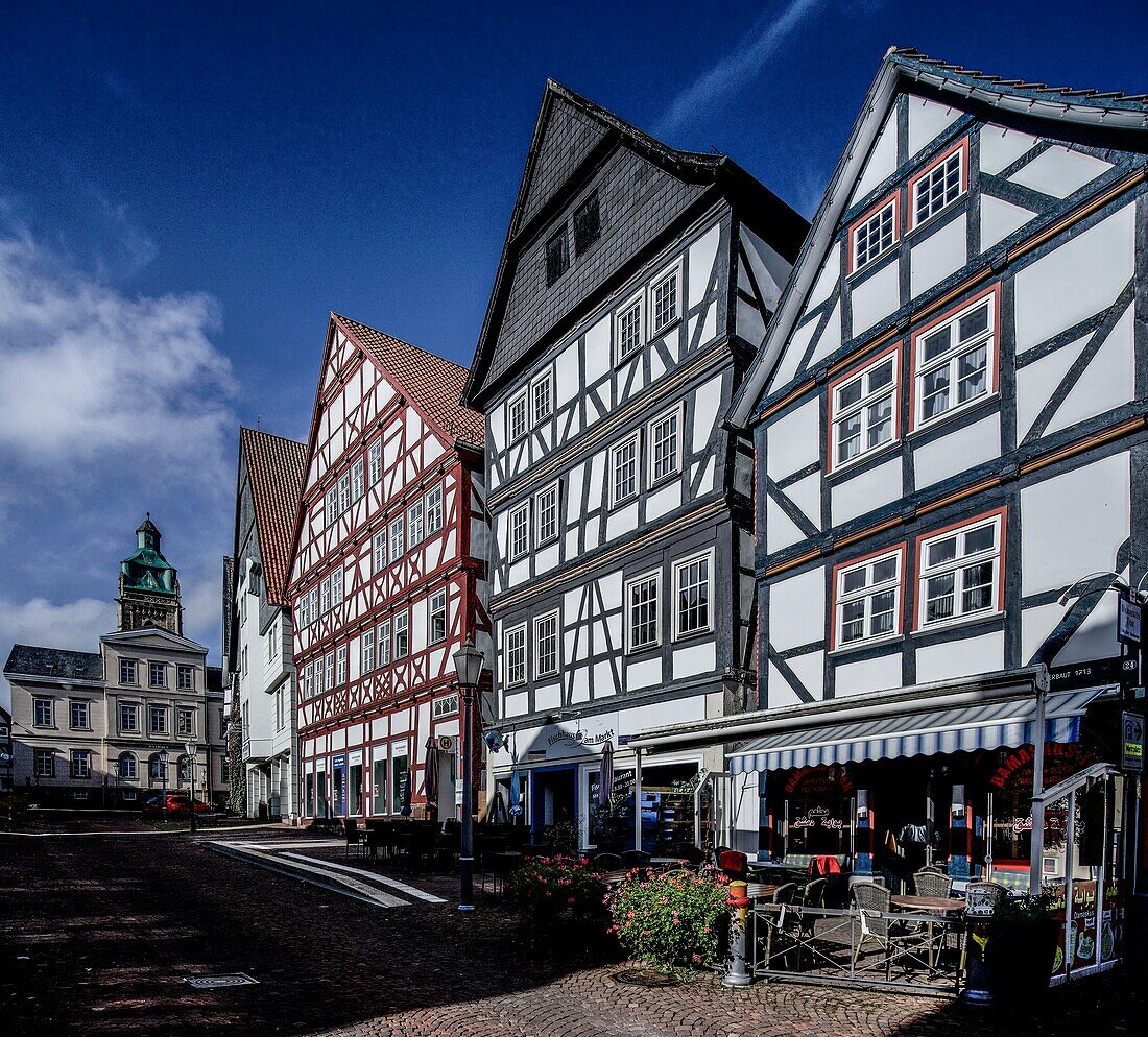  Half-timbered houses on the market square, old town of Bad Wildungen, in the background town hall and town church, Hesse, Germany 