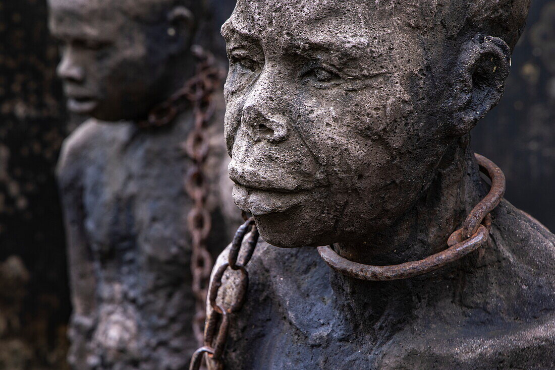  Sculpture of chained slaves at the Slave Market Memorial, Stonetown, Zanzibar City, Zanzibar, Tanzania, Africa 