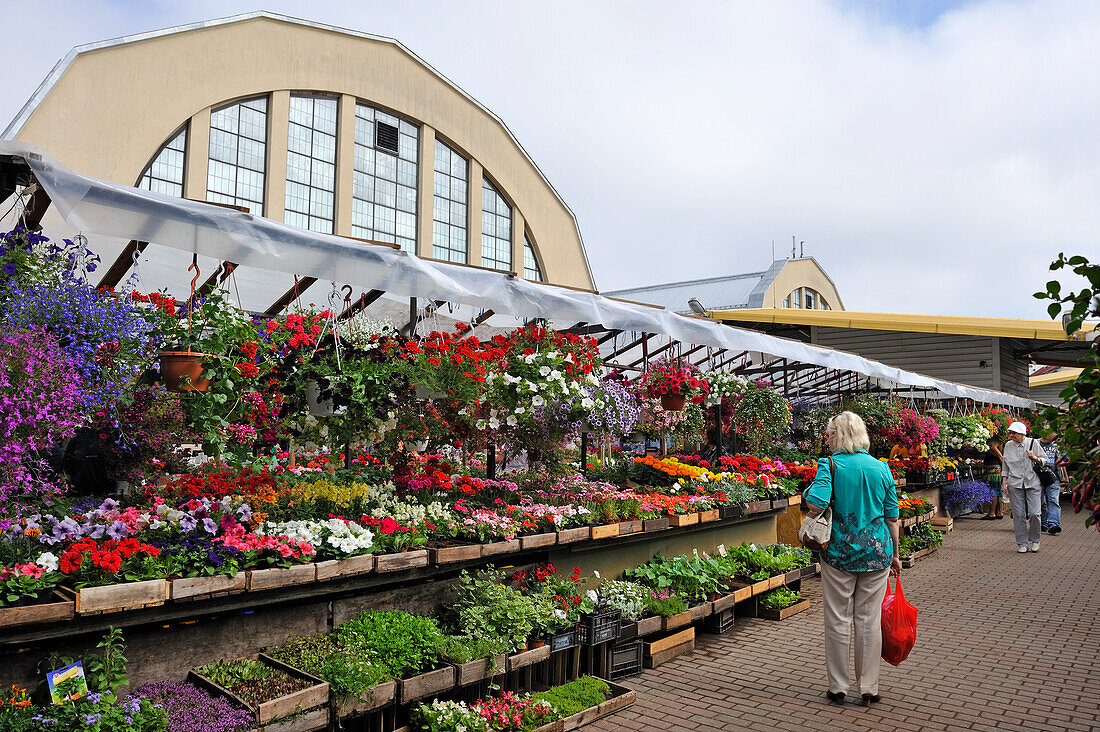 the flower market set outside the Central Market that is one of the largest and oldest markets in Europe with five food pavillons located inside vast converted Zeppelin hangars,Riga,Latvia,Baltic region,Northern Europe