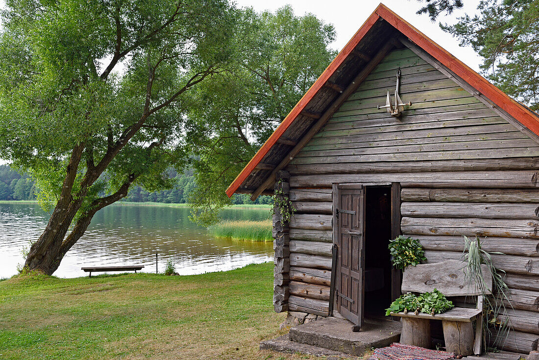 traditional sauna on the edge of Lusiai Lake at Paluse, Aukstaitija National Park, Lithuania, Europe