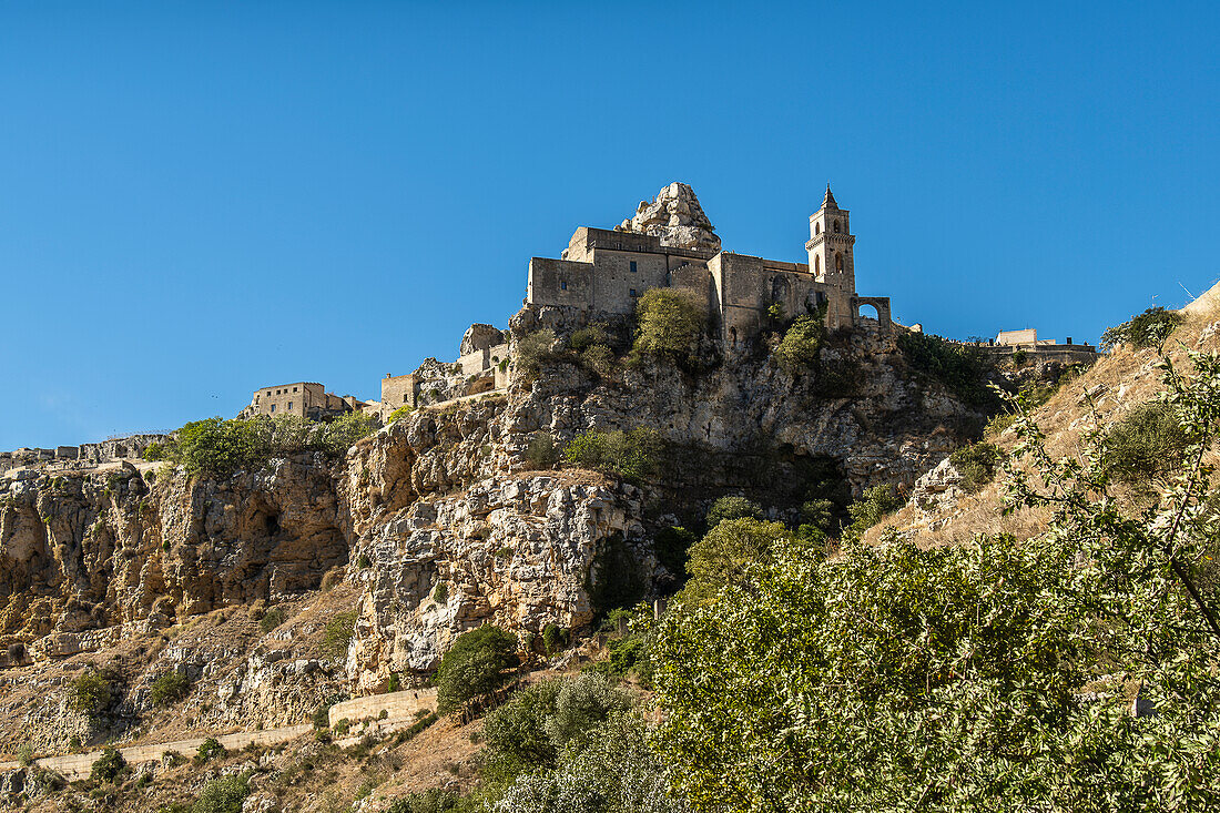 Saint Peter and Saint Paul Church (San Pietro Caveoso) seen from the Murgia Materana park (Parco della Murgia Materana), Matera, Basilicata, Italy.