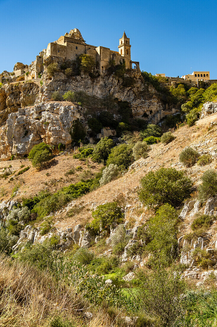 Saint Peter and Saint Paul Church (San Pietro Caveoso) seen from the Murgia Materana park (Parco della Murgia Materana), Matera, Basilicata, Italy.