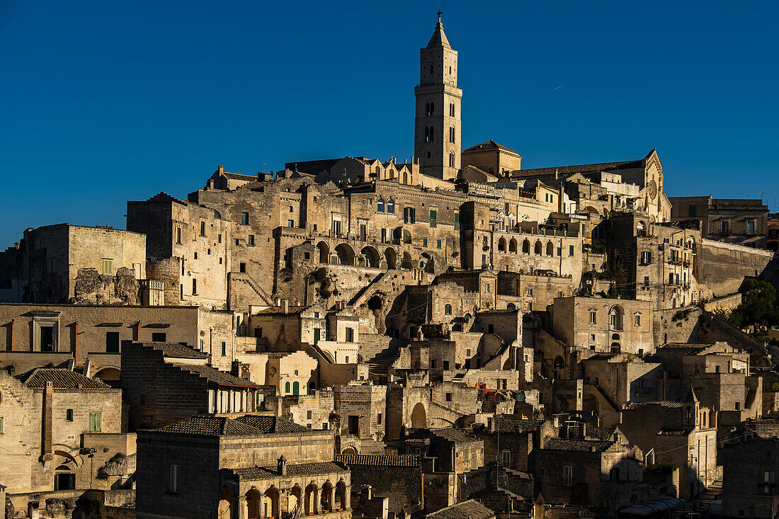 The Sassi di Matera, the historic center of Matera, with a view on the Matera cathedral, Matera, Basilicata, Italy.