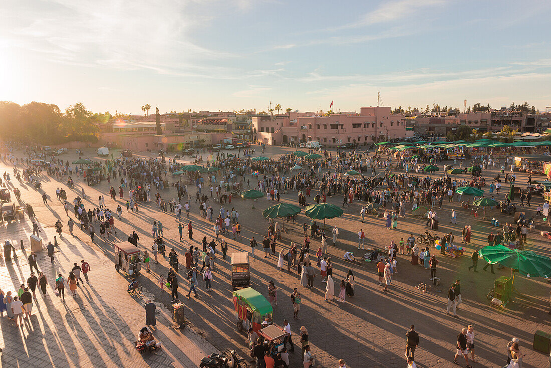  Jeema el-Fnaa in Marrakech in the old historic Medina in Morocco at sunset. 