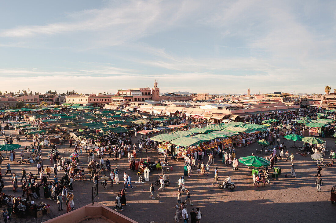  Jeema el-Fnaa in Marrakech in the old historic Medina in Morocco at sunset. 