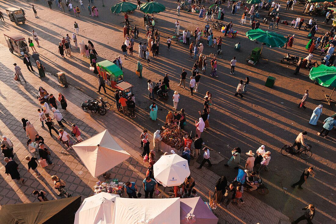  Jeema el-Fnaa in Marrakech in the old historic Medina in Morocco at sunset. 