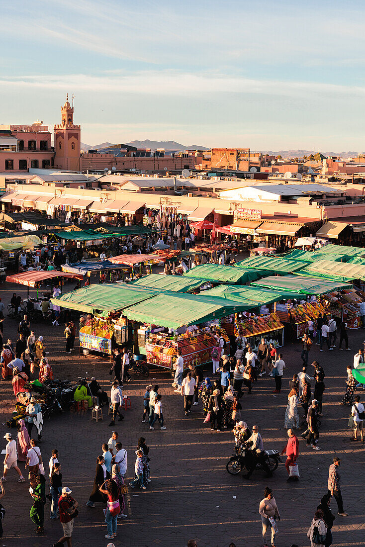  Jeema el-Fnaa in Marrakech in the old historic Medina in Morocco at sunset. 