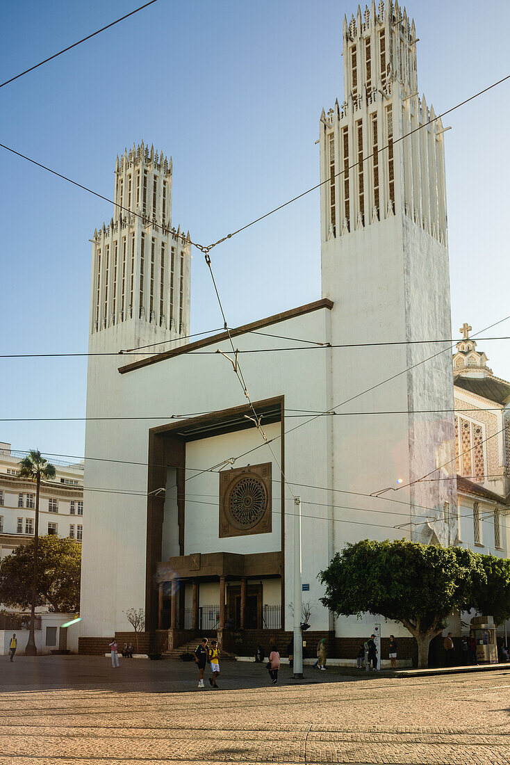  The Christian St. Peter&#39;s Cathedral in Rabat, Morocco, with public transport passing by. 