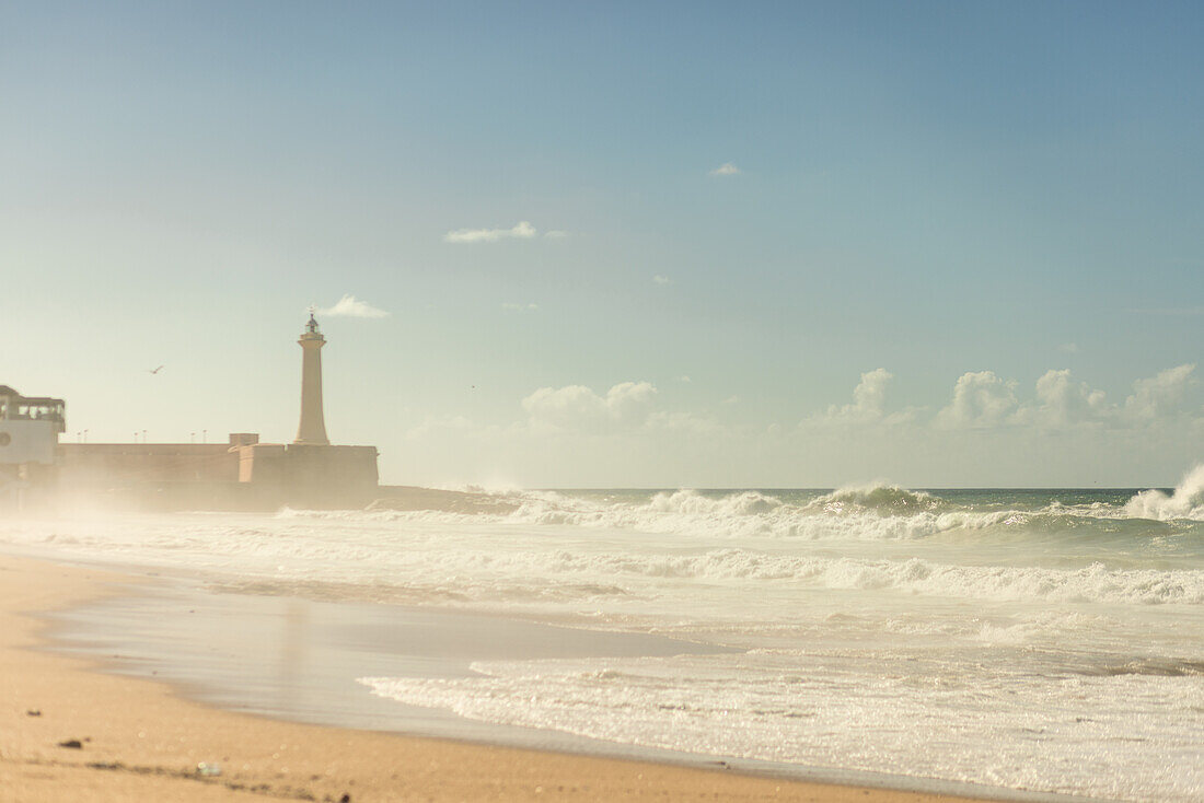  Surfer beach of Rabat at high tide at midday with high waves in Rabat, Morocco. 