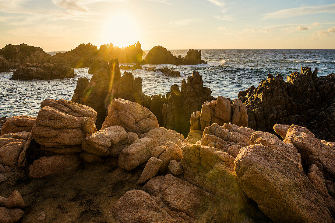  Red rocks by the sea, sunset, Costa Paradiso, Sardinia, Italy 