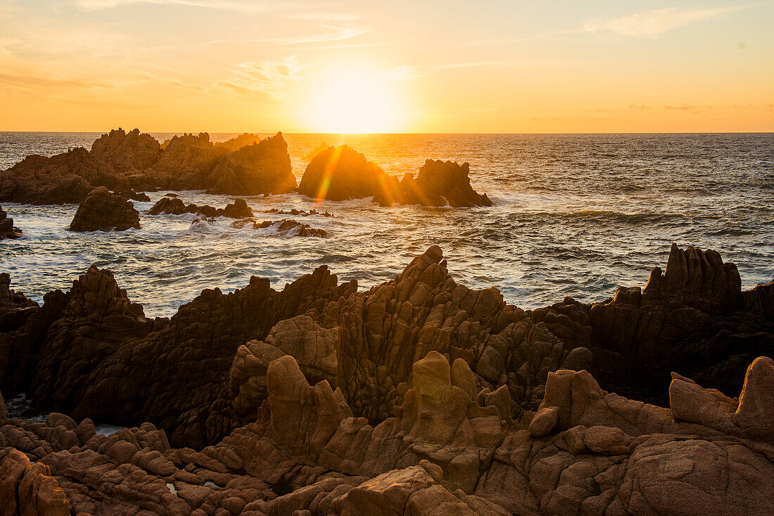  Red rocks by the sea, sunset, Costa Paradiso, Sardinia, Italy 