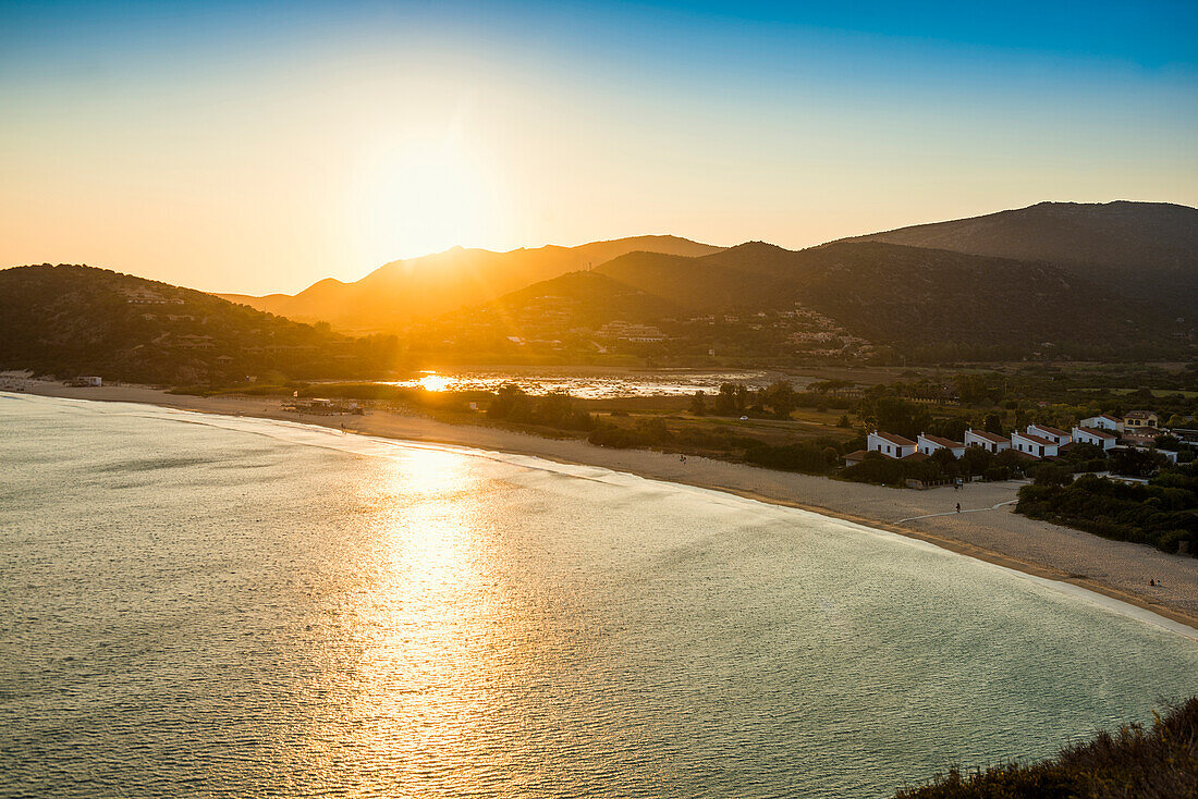  Beach and mountains, sunset, Spiaggia di Sa Colonia, Torre di Chia, Chia, south coast, Sardinia, Italy 