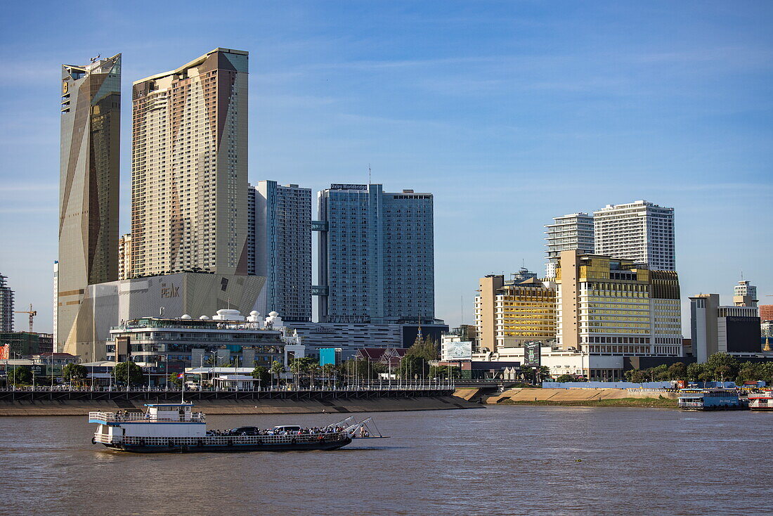  Car ferry on the Tonle Sap River with skyscrapers on the banks, Phnom Penh, Cambodia, Asia 