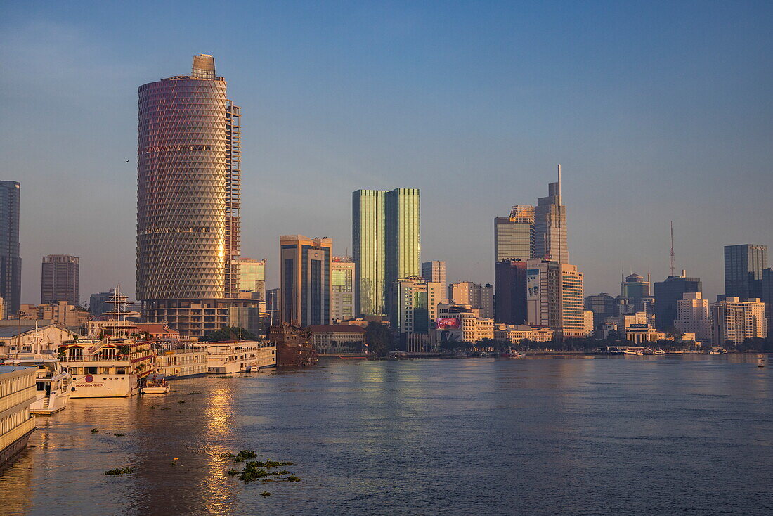  Skyscrapers in District 1 city center and Saigon River at sunrise, Ho Chi Minh City, Vietnam, Asia 