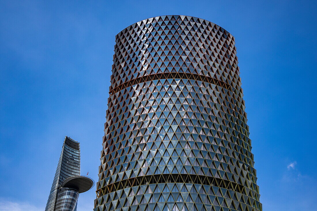  High-rise building under construction (has been lying idle as a ruin since 2013) with the Bitexco Financial Tower behind it, Ho Chi Minh City, Vietnam, Asia 