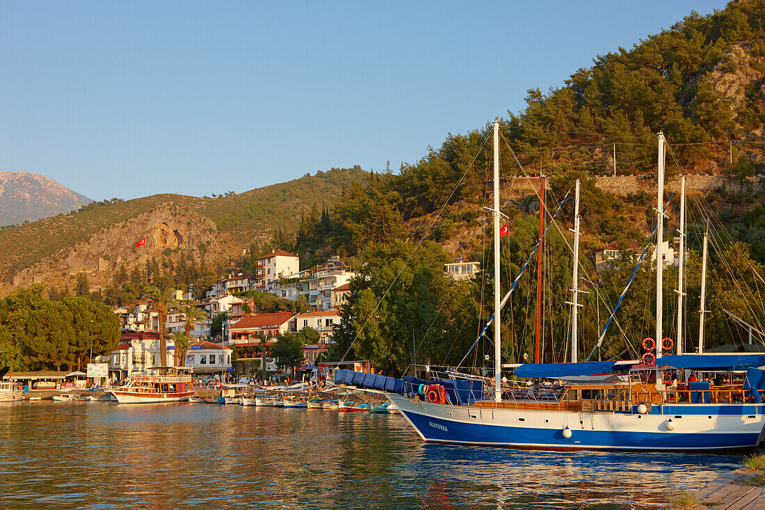 Boats in Fethiye marina at sunset. Fethiye, Mugla Province, Turkey.