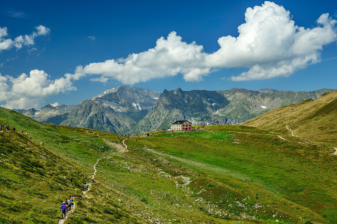  Many people hiking to Col de Balme with Chalet du Col de Balme, Aiguilles Rouges in the background, Tour du Mont Blanc, Mont Blanc Group, Graian Alps, Valais, Switzerland 