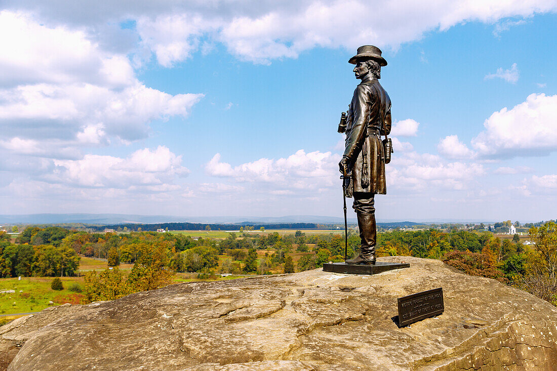  Monument of General Warren and view from Little Round Top over battlefields of the American Civil War in Gettysburg, Adams County, Pennsylvania, USA 