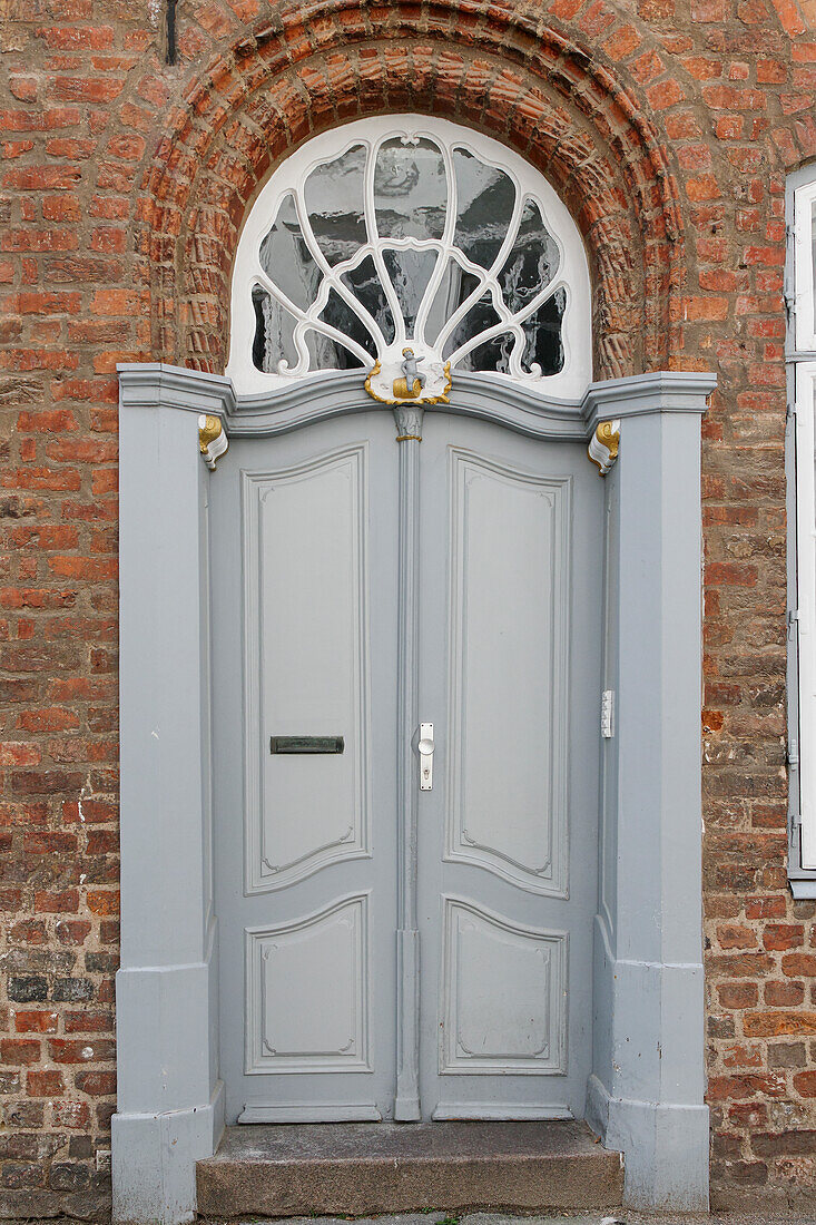  front door of a brick house 