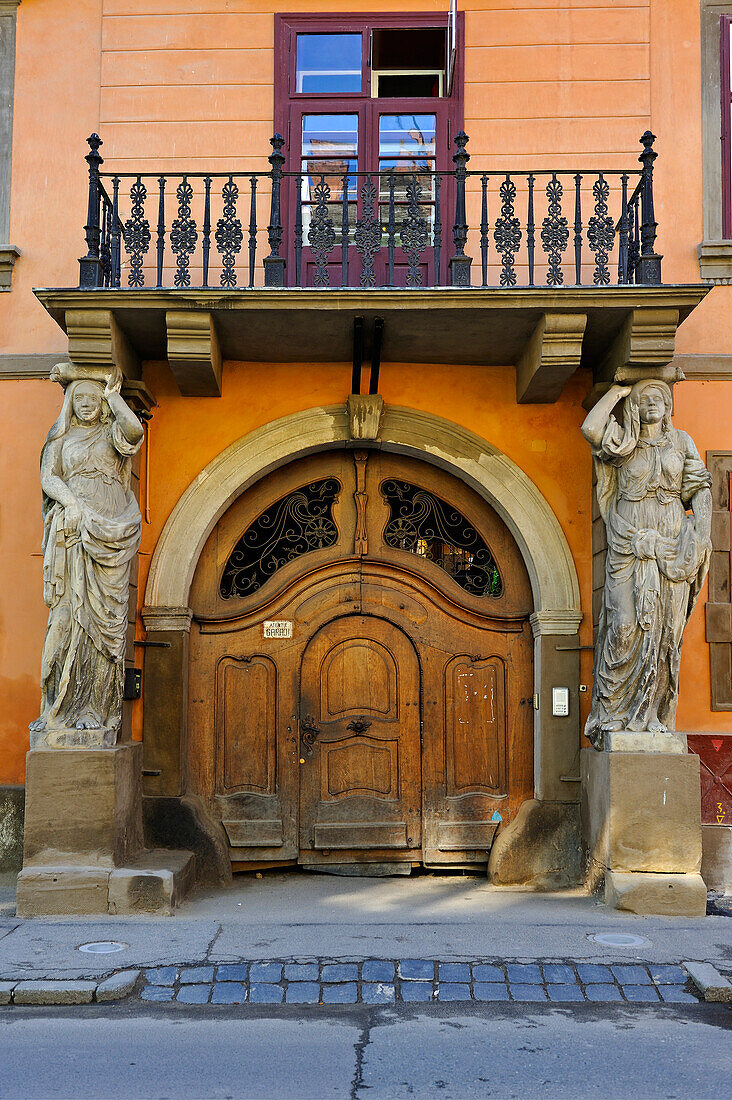 building front with atlas,Mitropoliei street, Old Town,Sibiu, Transylvania,Romania,Southeastern and Central Europe