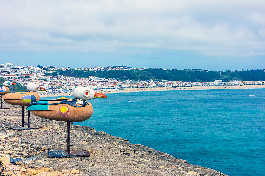  Nazaré is a Portuguese city on the Atlantic Ocean in the Oeste sub-region of the Centro region and the historical province of Estremadura, about 100 km north of Lisbon, here impressions of the fortress and the lighthouse in Nazare, venue of one of the largest surfing competitions in the world with 30 m high waves, Nazare, Portugal, Europe 