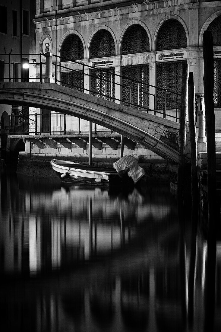  View of Venetian facades with bridge at night on a canal in San Marco, Venice, Veneto, Italy, Europe 