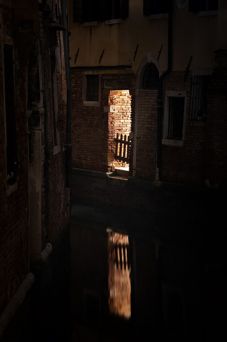  View of Venetian facades at night on a canal in San Marco, Venice, Veneto, Italy, Europe 